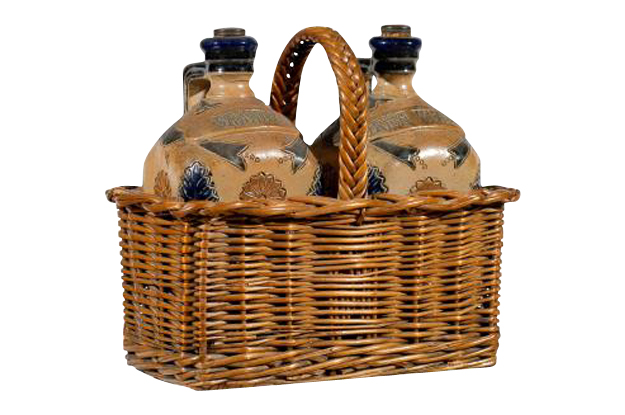 Two Victorian English Pottery Decanters in Tantalus-Inspired Wicker Basket