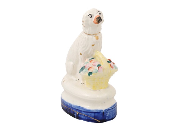 ON HOLD - Petite English Michael Davis Porcelain Dog with Fruit Basket and Blue Oval Base