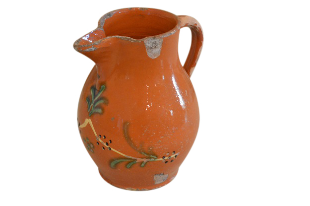 French 19th Century Redware Floral Pitcher with Orange, Cream and Green Glaze
