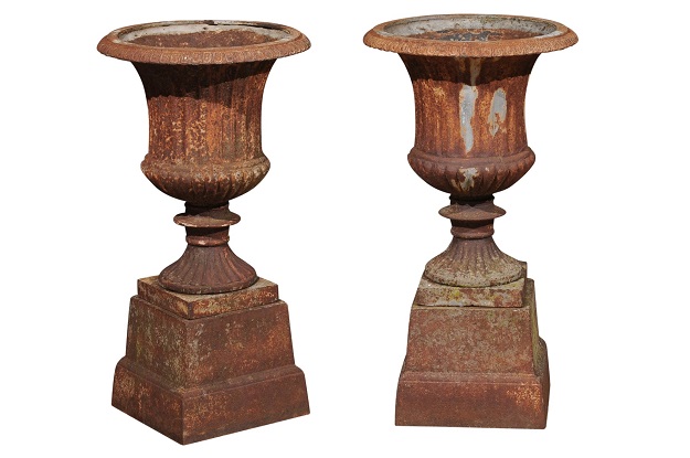 Pair of French 19th Century Iron Médicis Vases on Stepped Pedestals with Patina