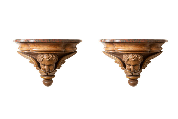 Pair of French 1880s Carved Walnut Brackets with Cherubs and Faux Marble Tops