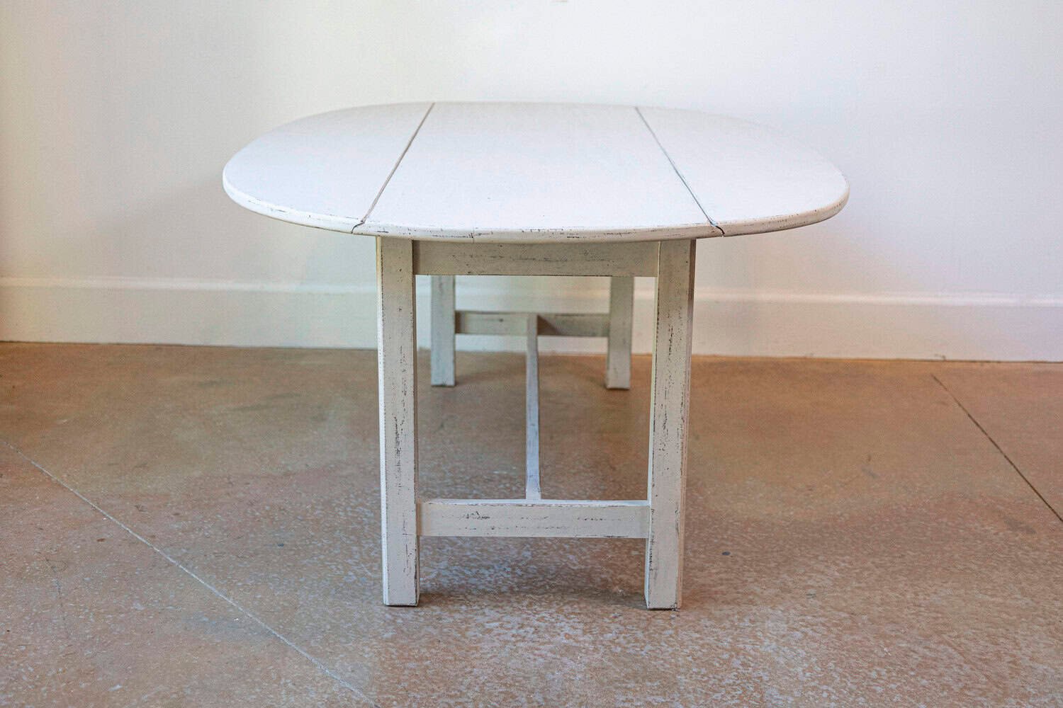 Swedish 1920s Gray Painted Drop Leaf Coffee Table with Oval Top and Stretcher - JAA