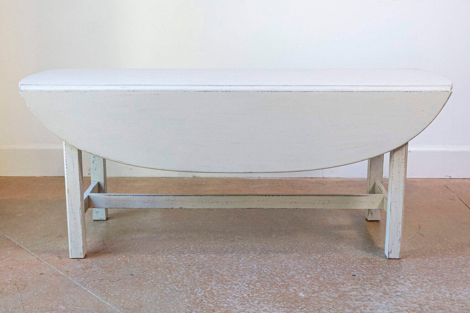 Swedish 1920s Gray Painted Drop Leaf Coffee Table with Oval Top and Stretcher - JAA