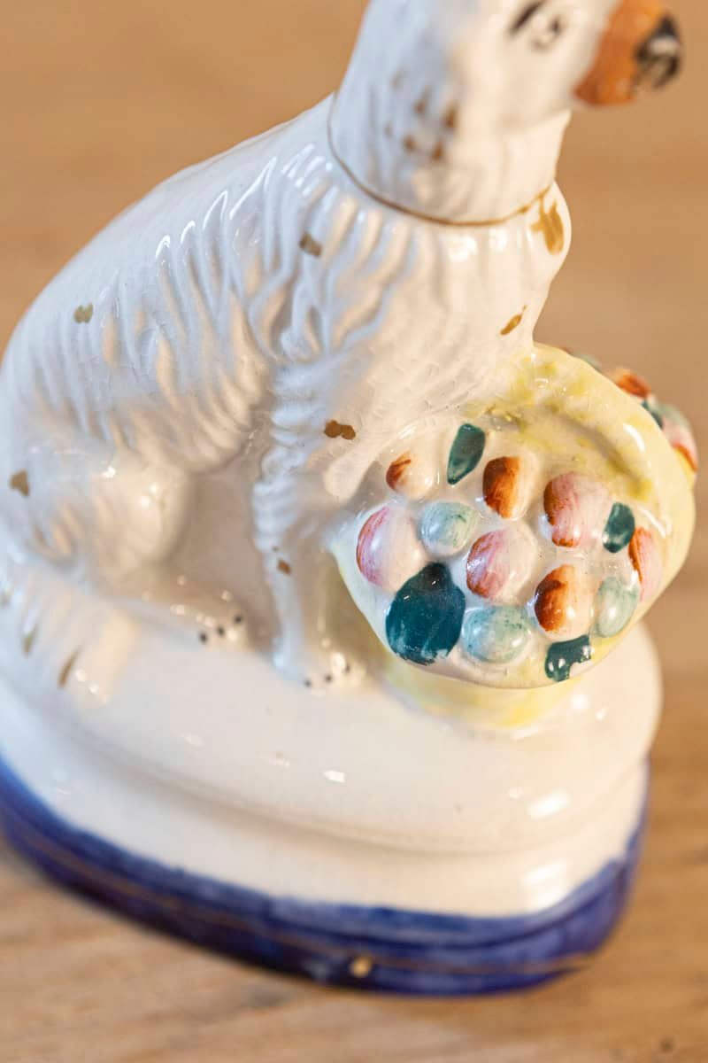 English 20th Century Petite Michael Davis Porcelain Dog with Fruit Basket and Blue Oval Base - JAA