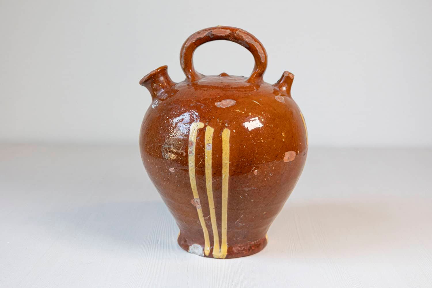 French 19th Century Rustic Pottery Jug with Russet Ground and Yellow Stripes - JAA