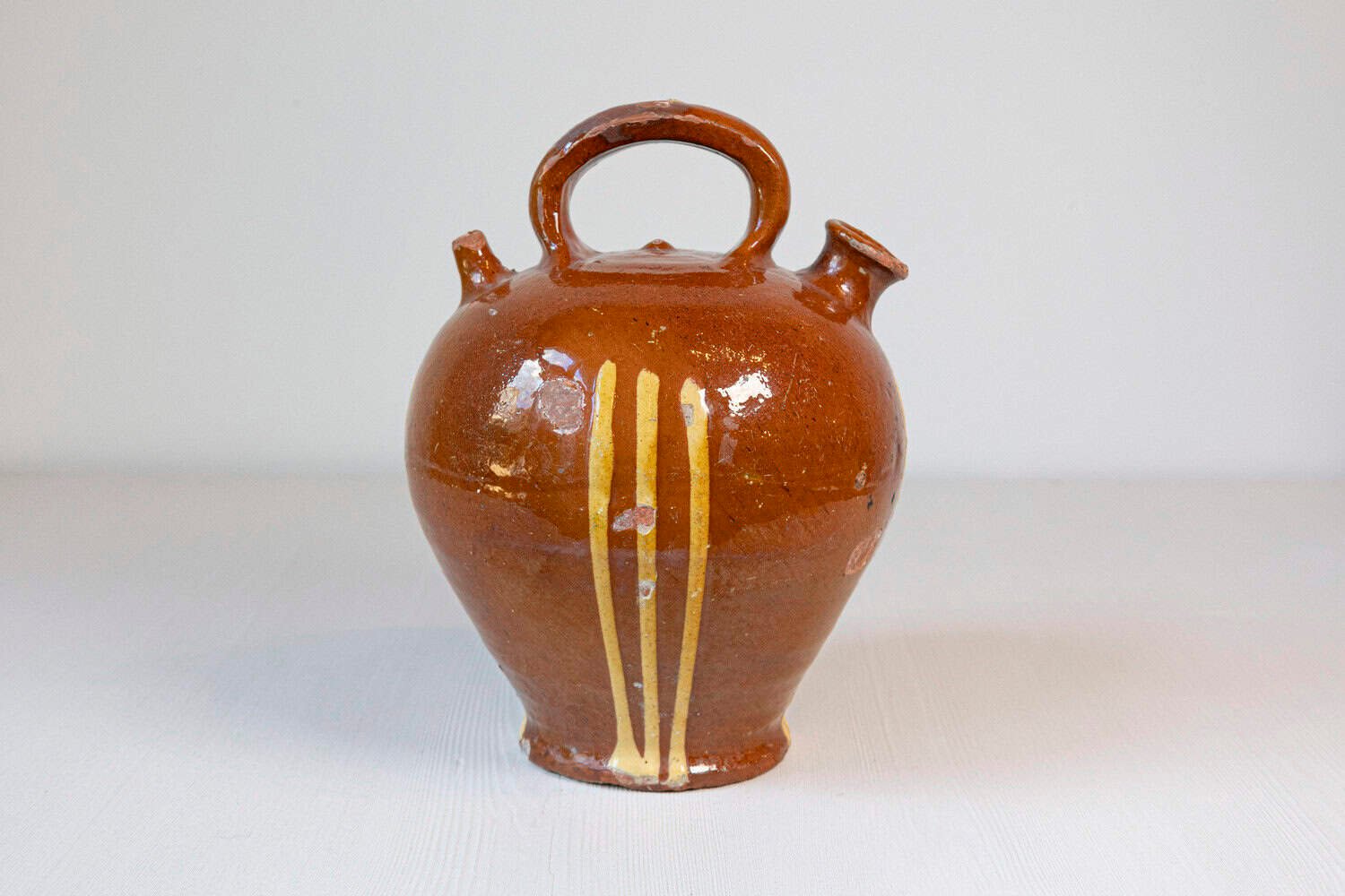 French 19th Century Rustic Pottery Jug with Russet Ground and Yellow Stripes - JAA