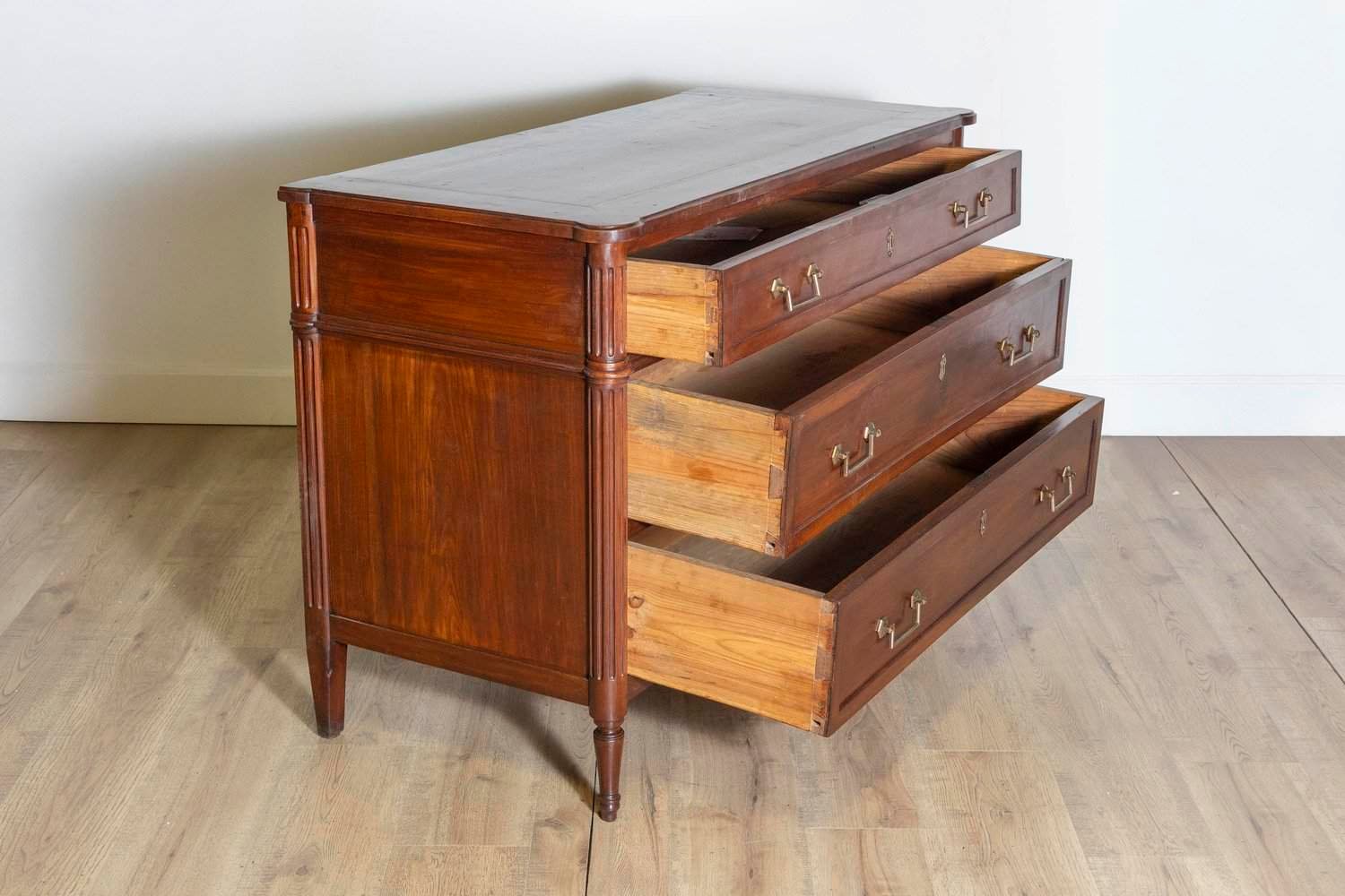 French Louis XVI Style 19th Century Cherry Three-Drawer Commode with Fluting - JAA