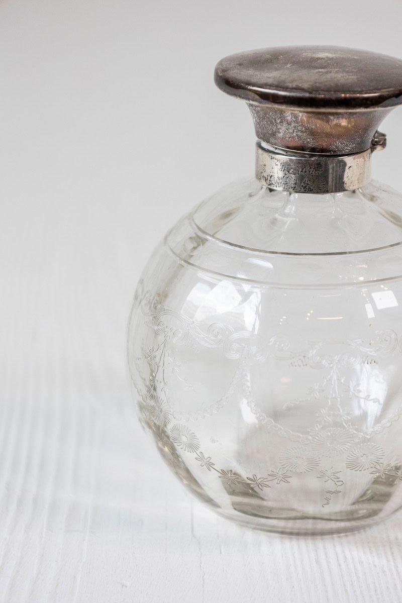 Small English 20th Century Glass Vanity Bottle with Silver Lid and Etched Design - JAA