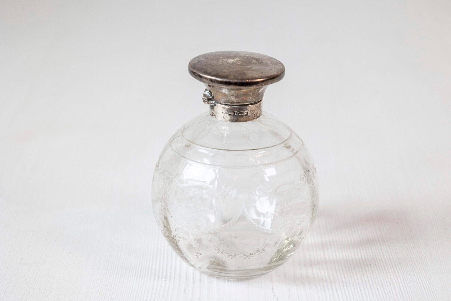 Small English 20th Century Glass Vanity Bottle with Silver Lid and Etched Design - JAA