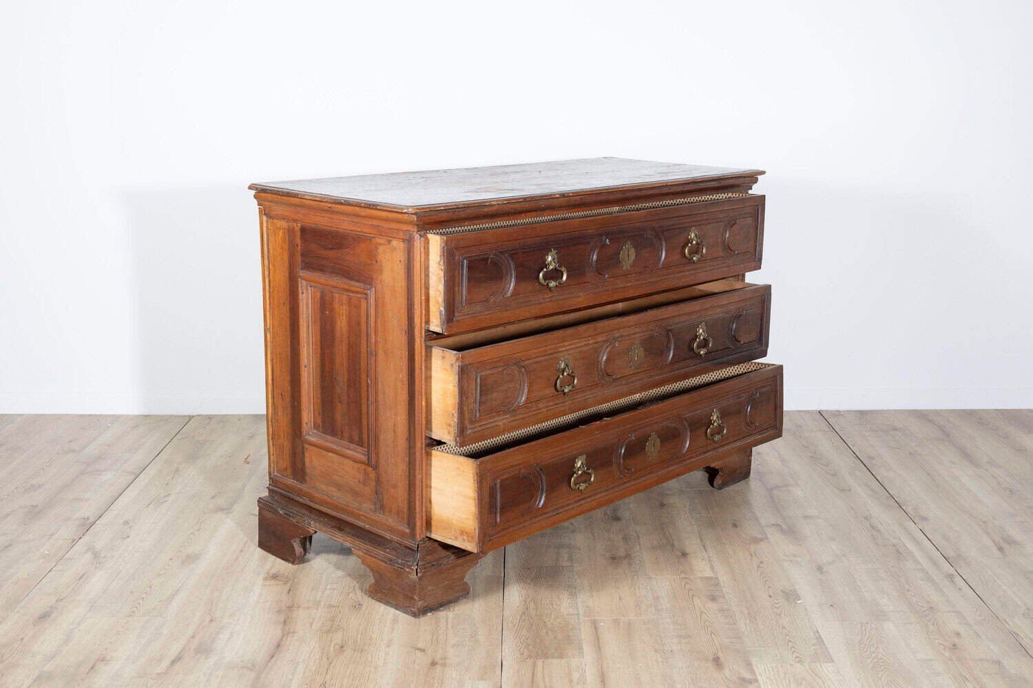 Emilian Bolognese Walnut Chest of Drawers with Rusticated Drawers, Mid-17th Century - JAA