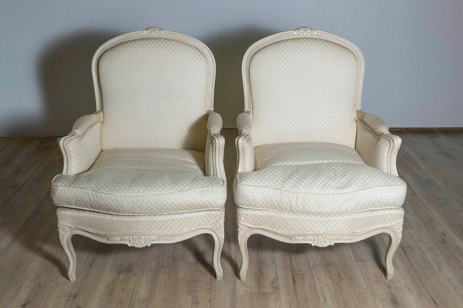 Louis XV Style French Cream Painted Wood Carved Bergères Chairs, a Pair - JAA