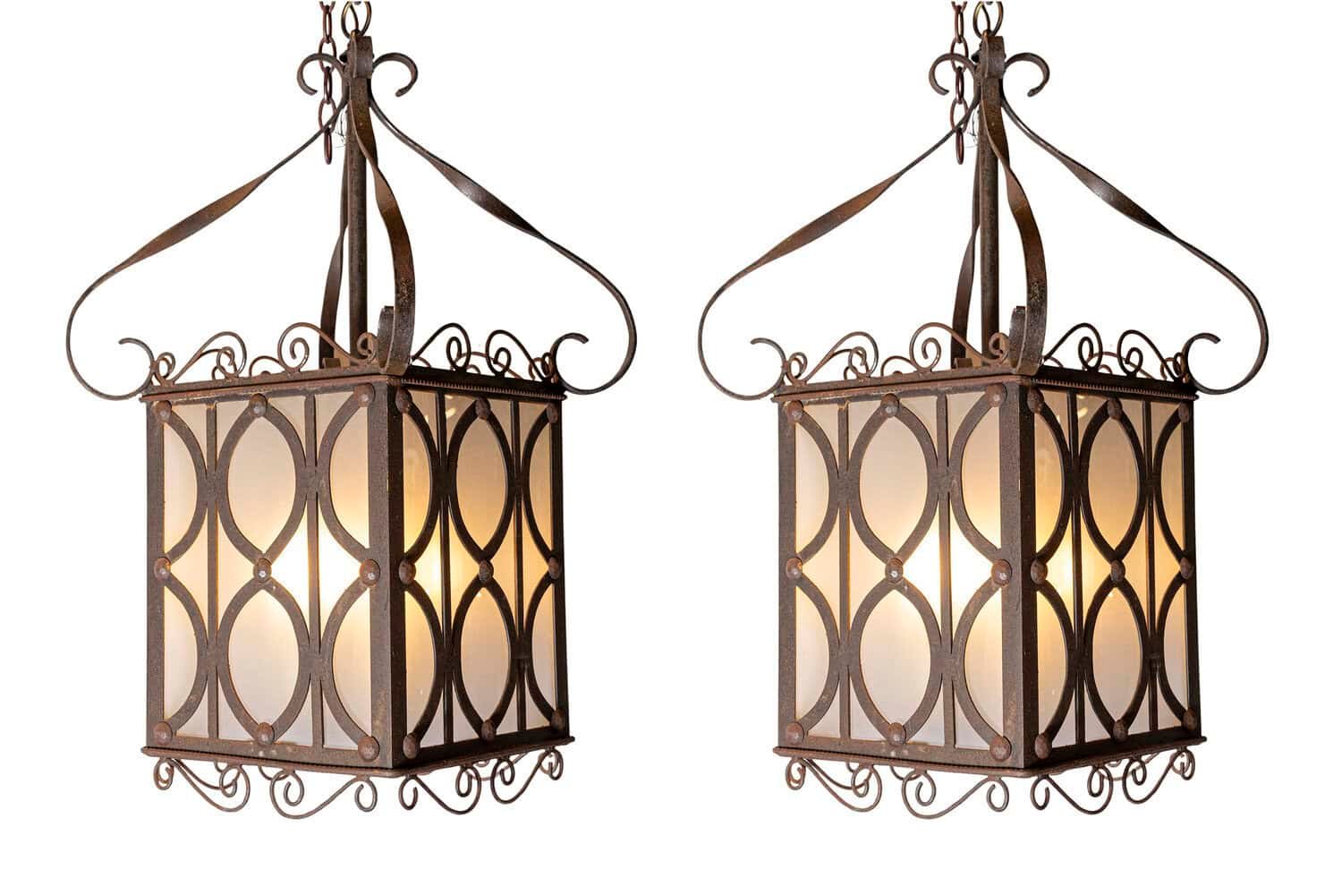 Elegant Pair of 20th-Century French Iron Lanterns with Scrollwork Detail