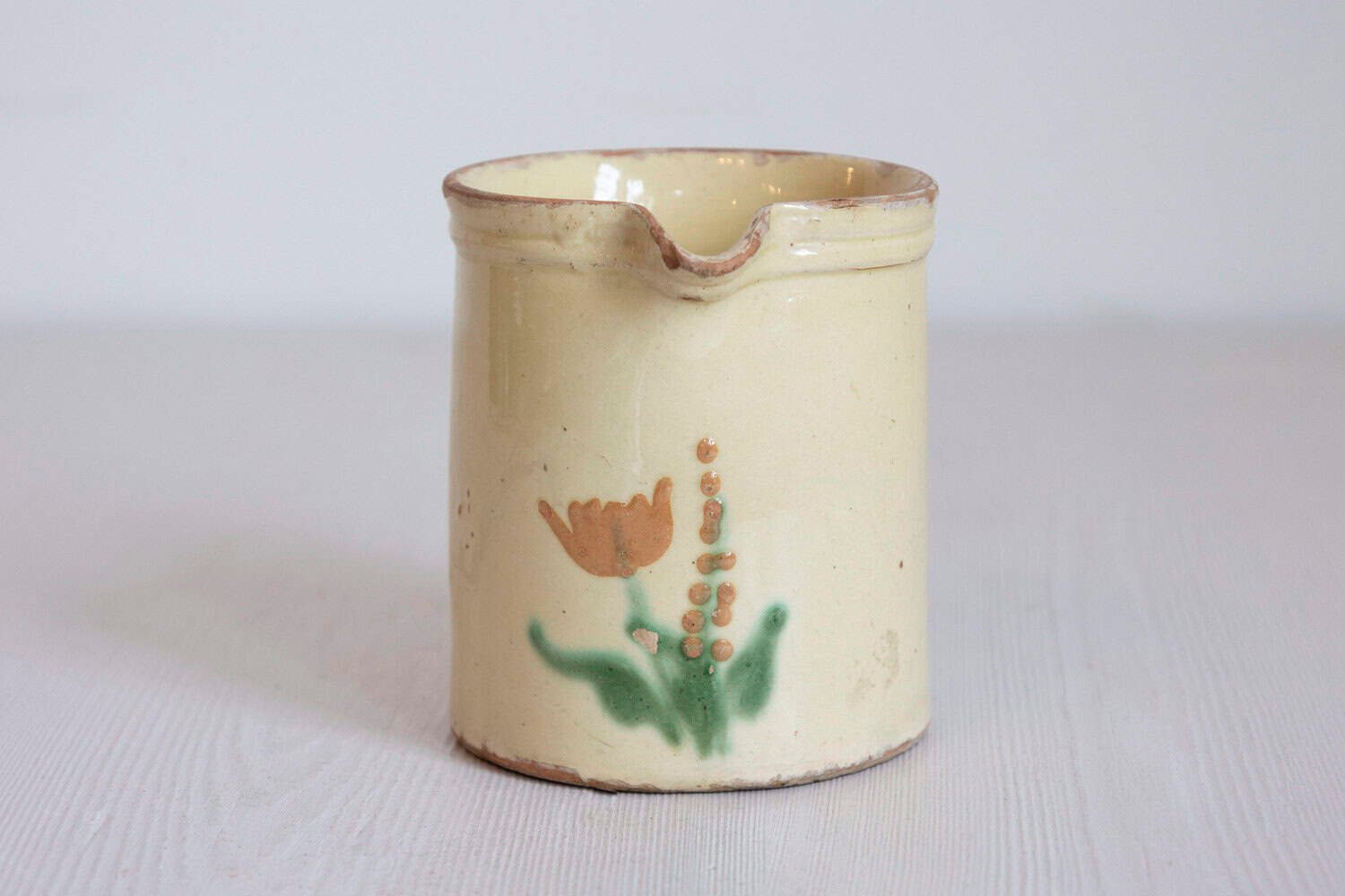 French 19th Century Cream Glazed Terracotta Pitcher with Floral Décor - JAA