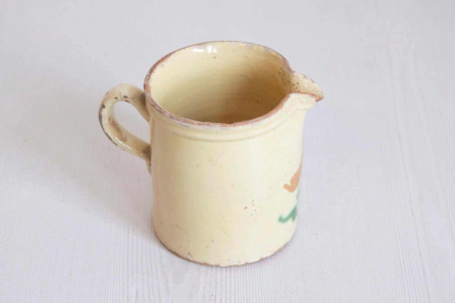 French 19th Century Cream Glazed Terracotta Pitcher with Floral Décor - JAA