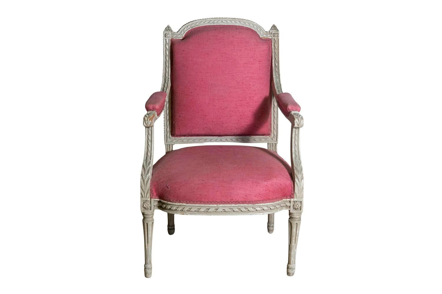 French Louis XVI Style 19th Century Painted Fauteuil with Abundant Carved Décor