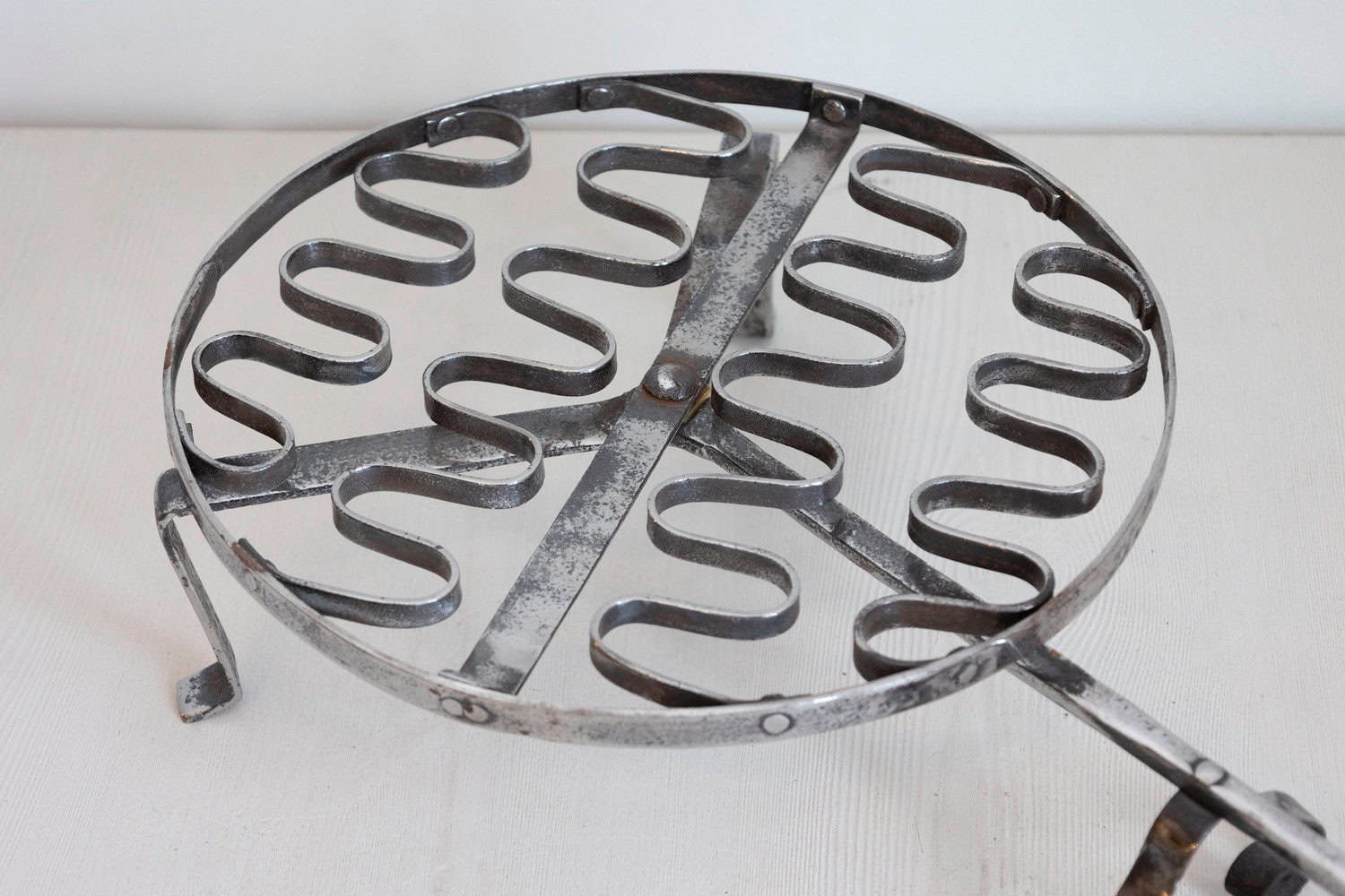 French 19th Century Iron Fireplace Grill with Petite Feet and Scroll-Supported Handle - JAA