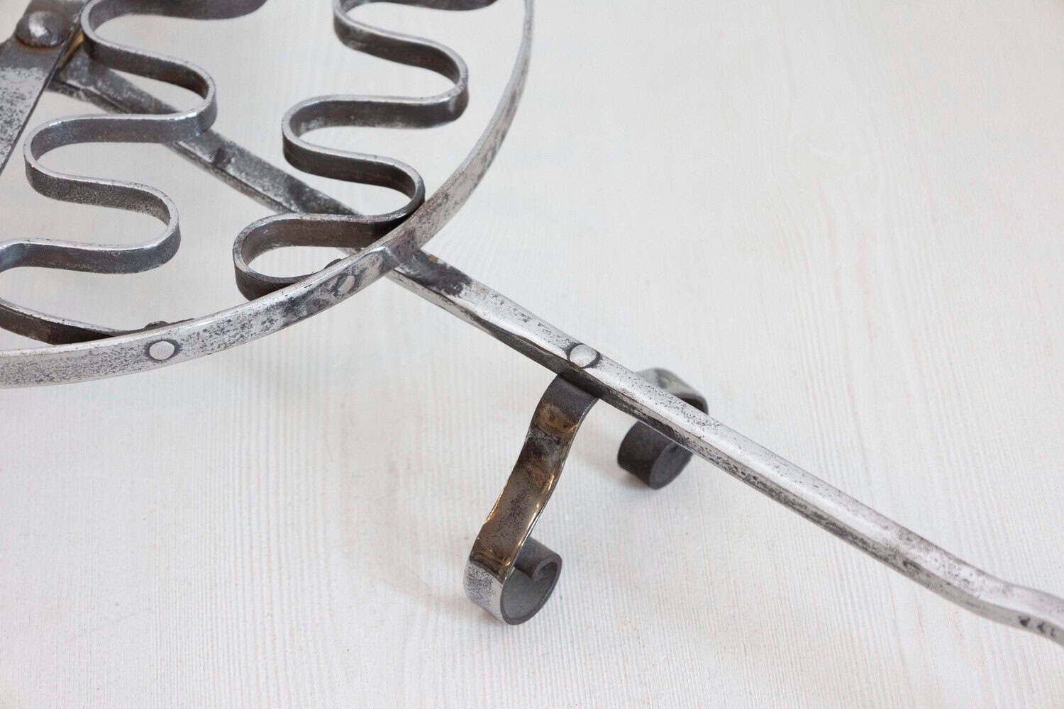 French 19th Century Iron Fireplace Grill with Petite Feet and Scroll-Supported Handle - JAA