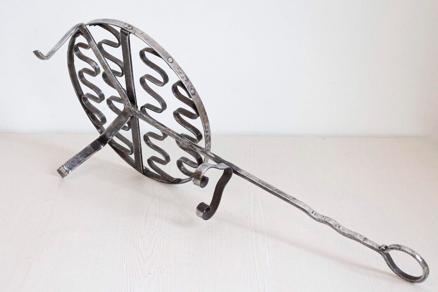 French 19th Century Iron Fireplace Grill with Petite Feet and Scroll-Supported Handle - JAA