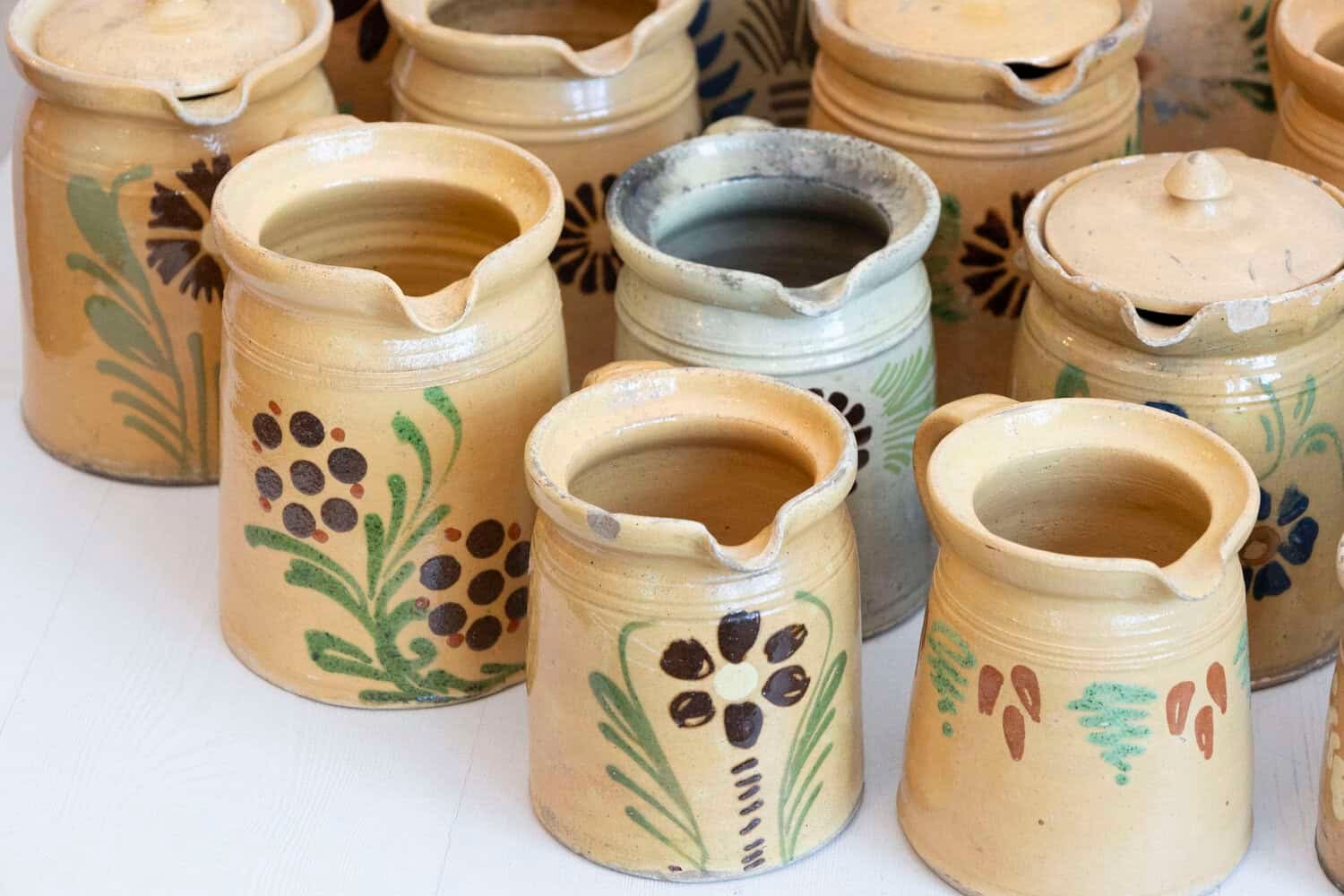 French 19th Century Terracotta Pottery Pitchers with Floral Décor - JAA