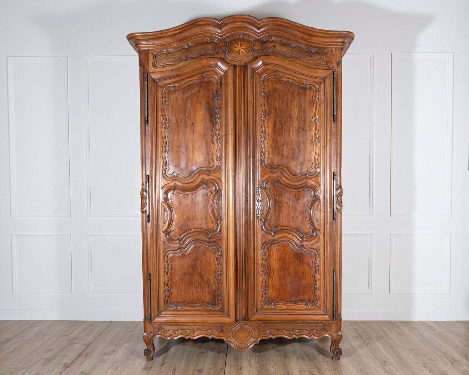 French 18th Century Lyonnaise Walnut Armoire with Double Arched Cornice and Star Motif - JAA