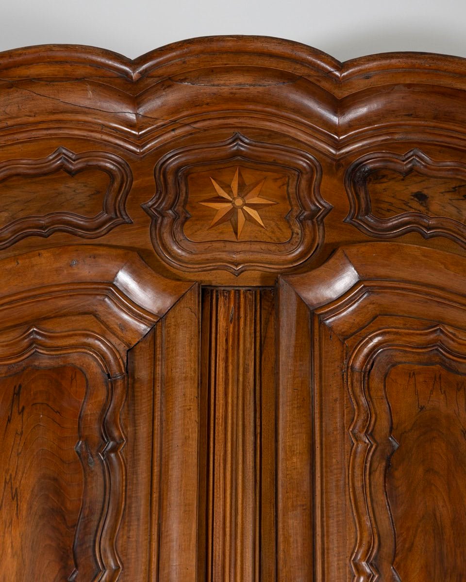 French 18th Century Lyonnaise Walnut Armoire with Double Arched Cornice and Star Motif - JAA