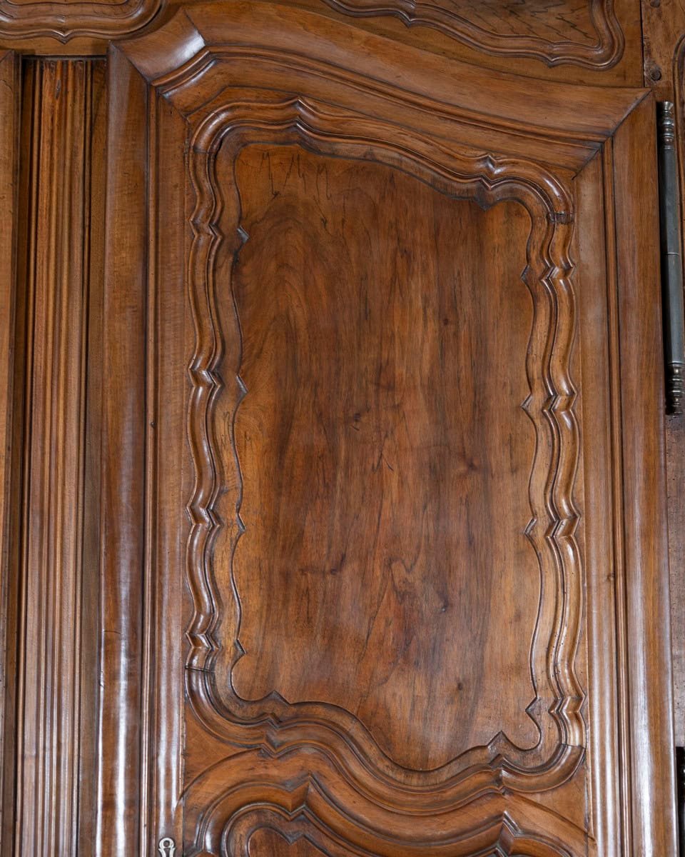 French 18th Century Lyonnaise Walnut Armoire with Double Arched Cornice and Star Motif - JAA