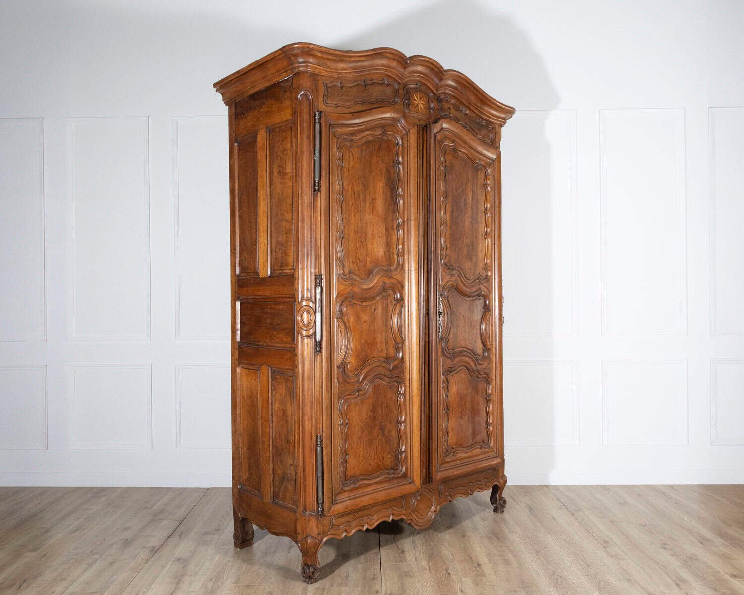 French 18th Century Lyonnaise Walnut Armoire with Double Arched Cornice and Star Motif - JAA