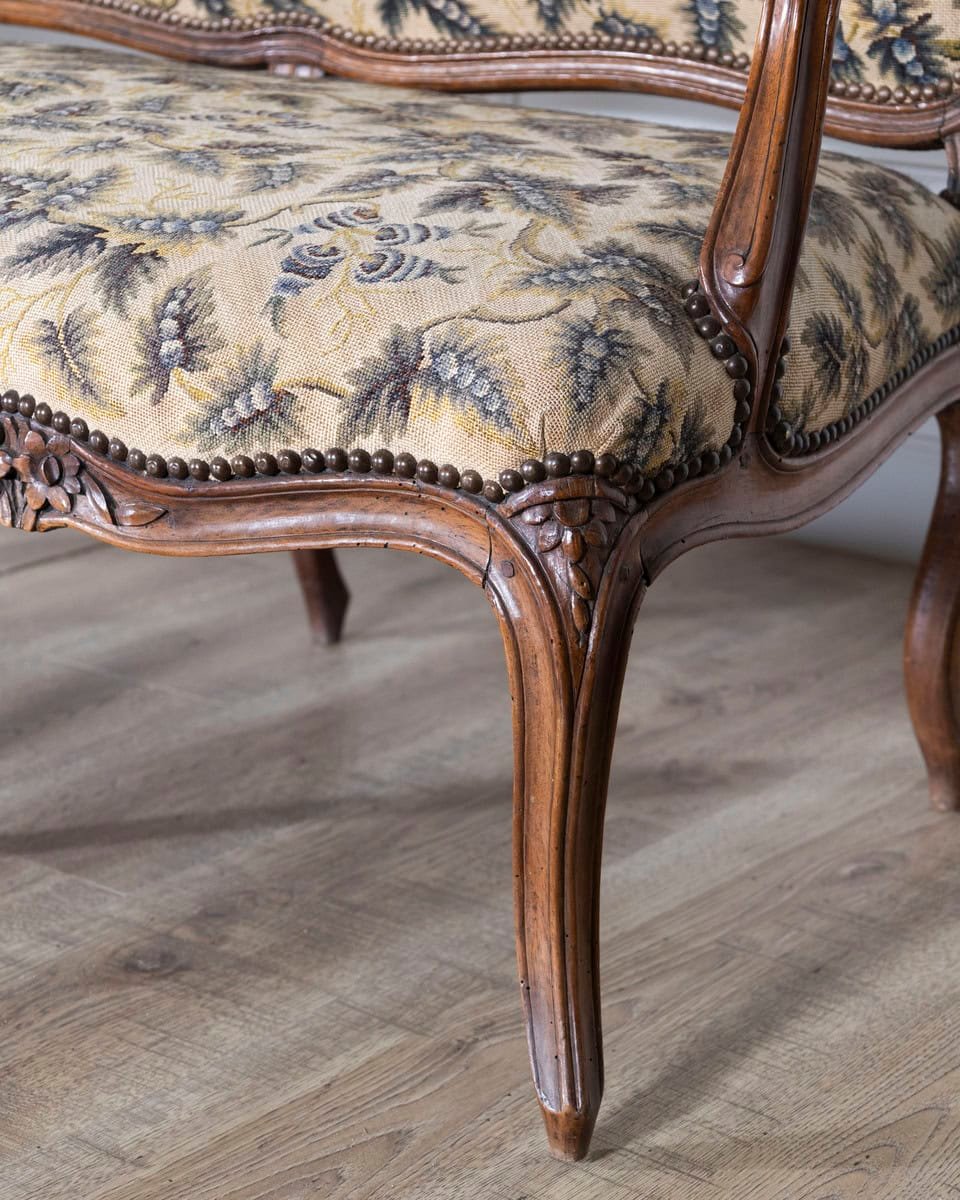 18th Century Louis XV Period Walnut Sofa with Floral Carvings and Tapestry Upholstery - JAA