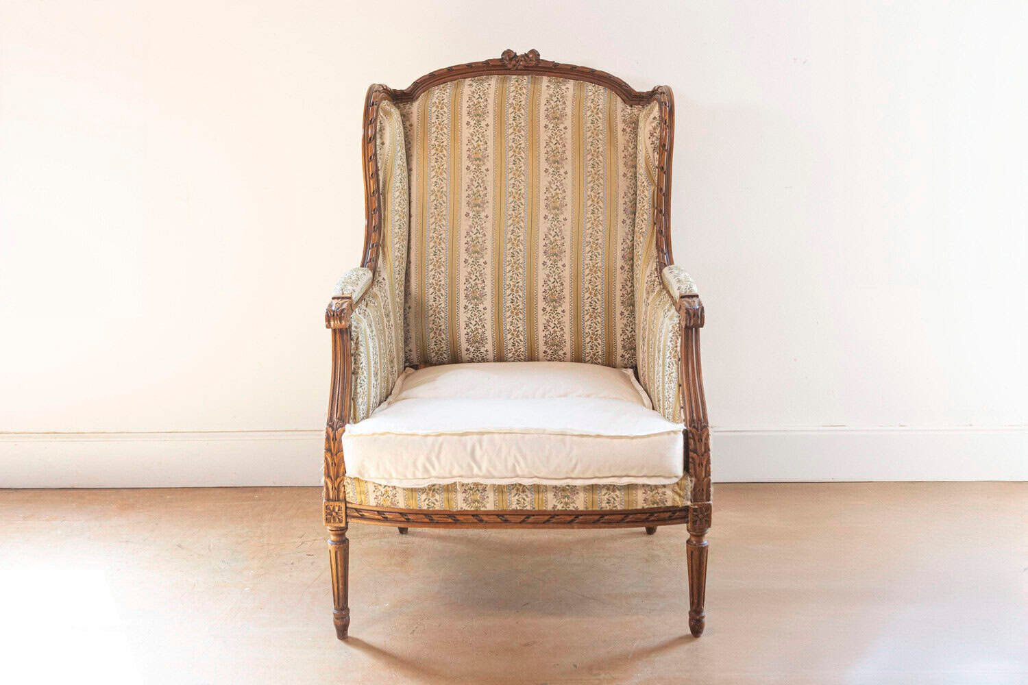 French Louis XVI Style 19th Century Walnut Bergère à Oreilles with Carved Roses - JAA