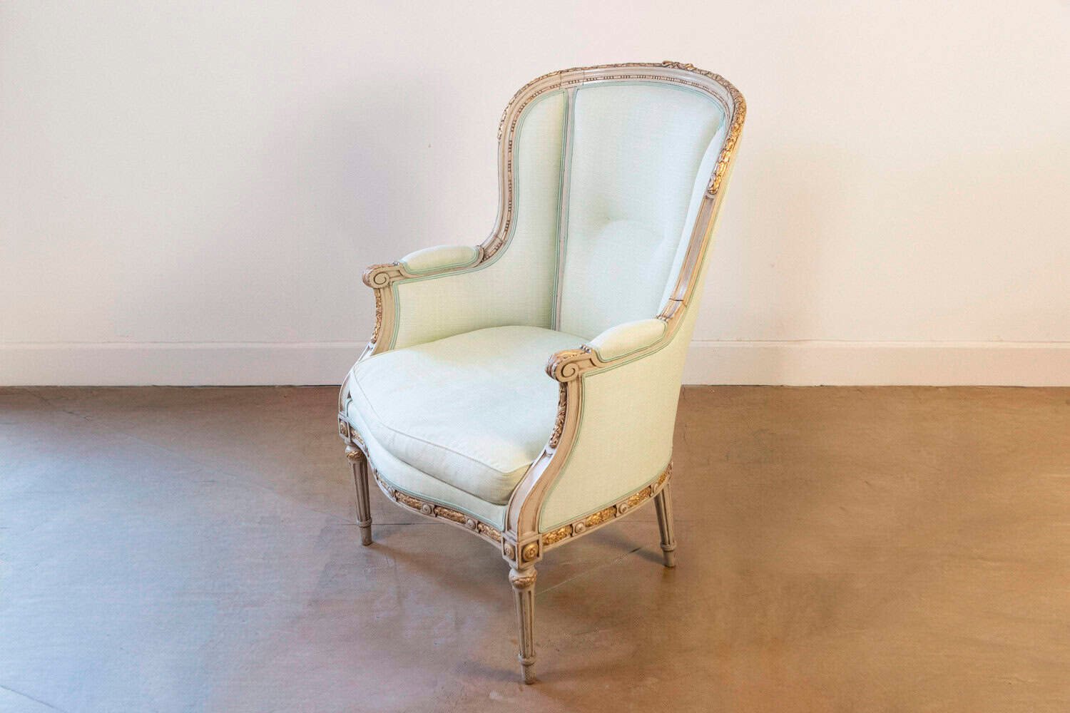 Pair of French Louis XVI Style 1900s Painted and Parcel-Gilt Bergères Chairs - JAA
