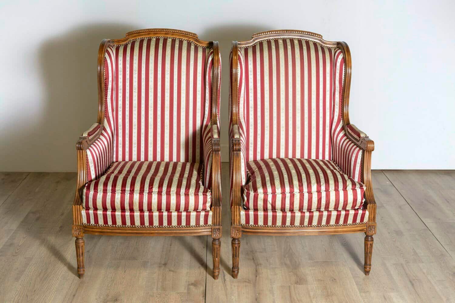 French Louis XVI Style Walnut Bergères à Oreilles with Fluted Legs, a Pair - JAA