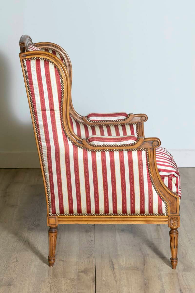 French Louis XVI Style Walnut Bergères à Oreilles with Fluted Legs, a Pair - JAA