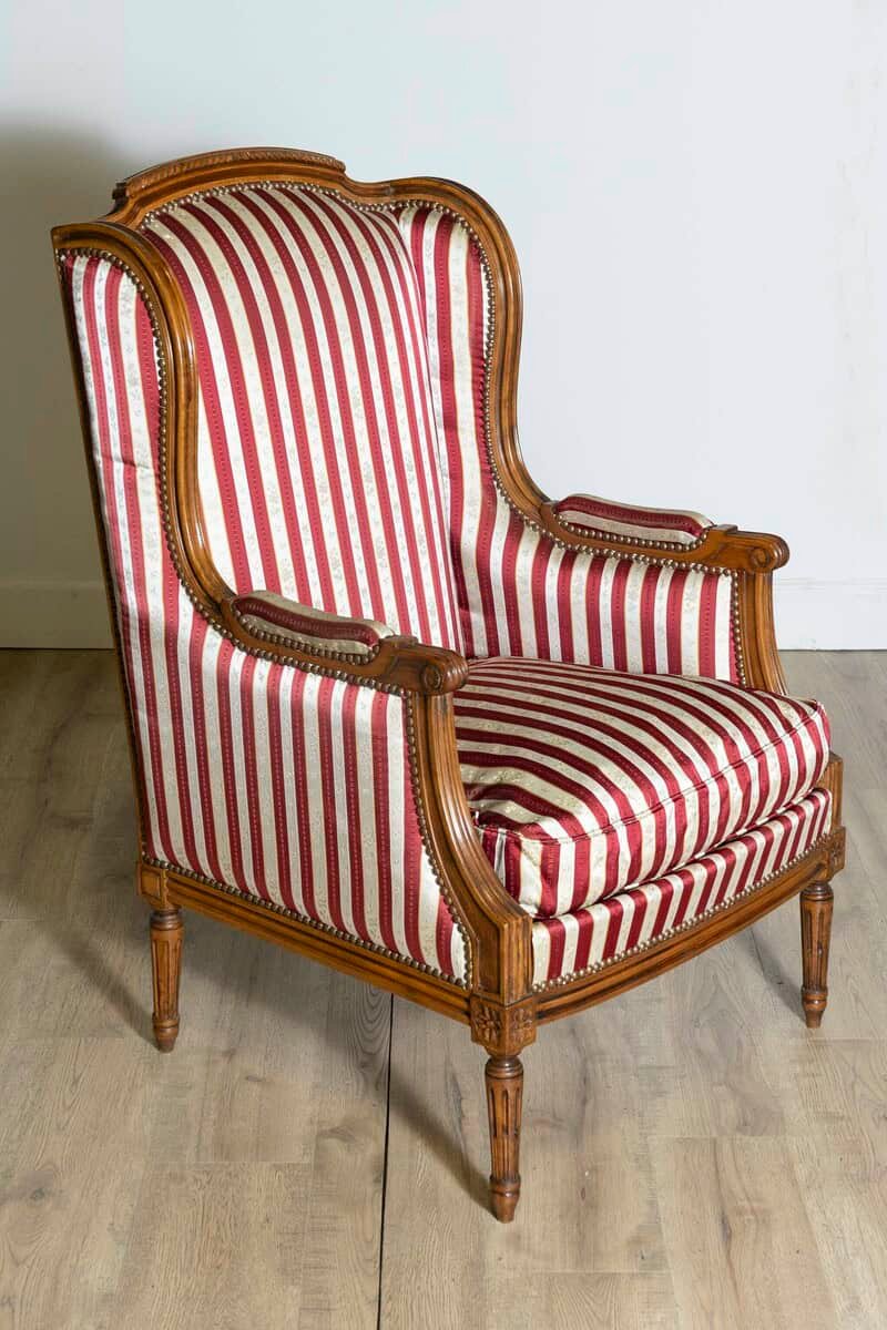 French Louis XVI Style Walnut Bergères à Oreilles with Fluted Legs, a Pair - JAA