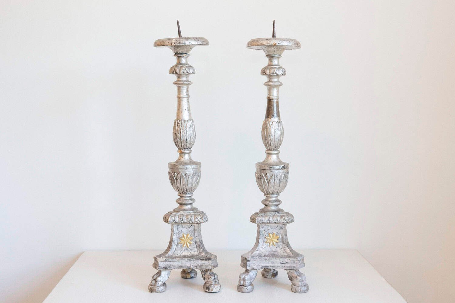 Pair of Italian 18th Century Silver Candlesticks with Gilt Star and Waterleaves - JAA