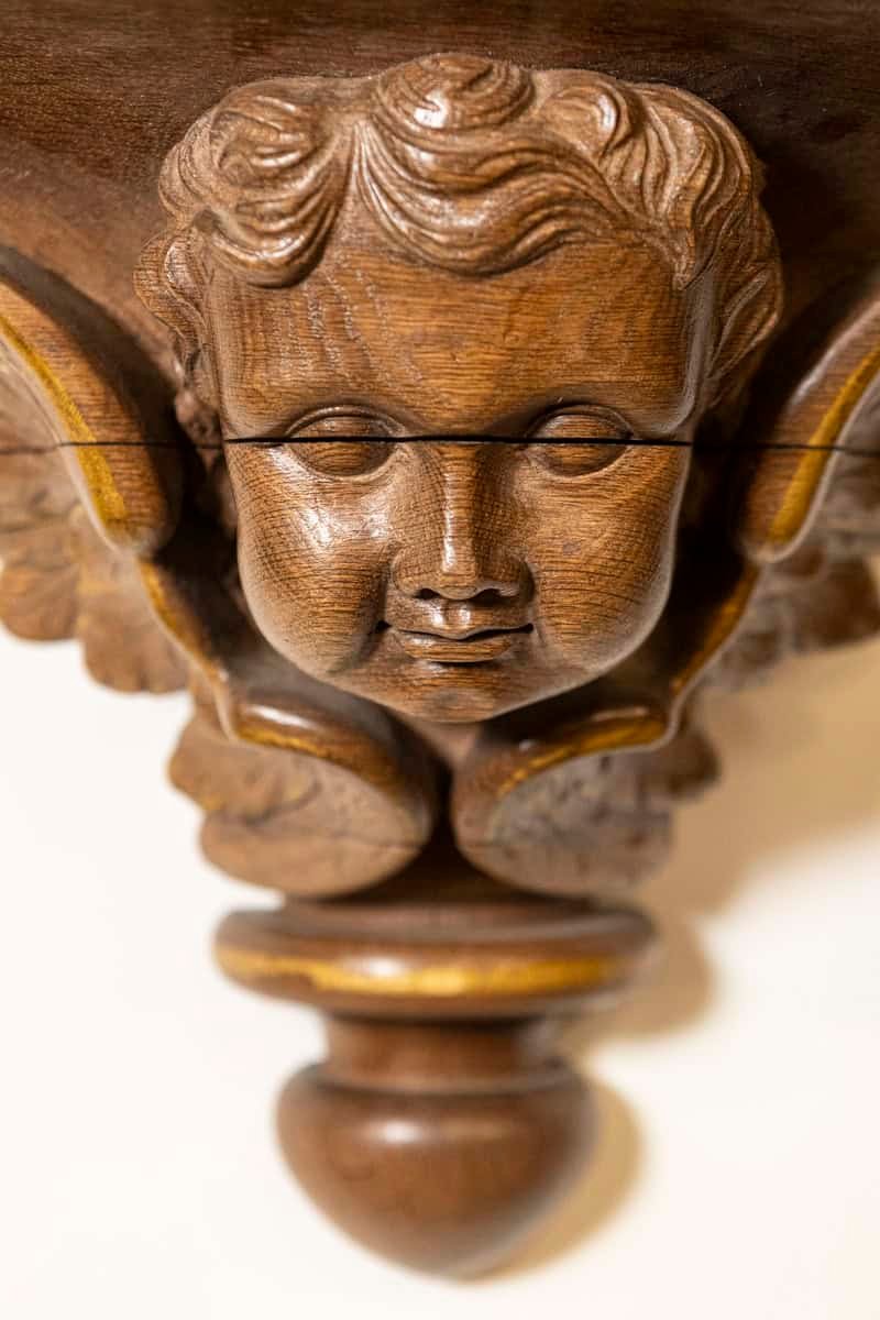 Pair of French 1880s Carved Walnut Brackets with Cherubs and Faux Marble Tops - JAA