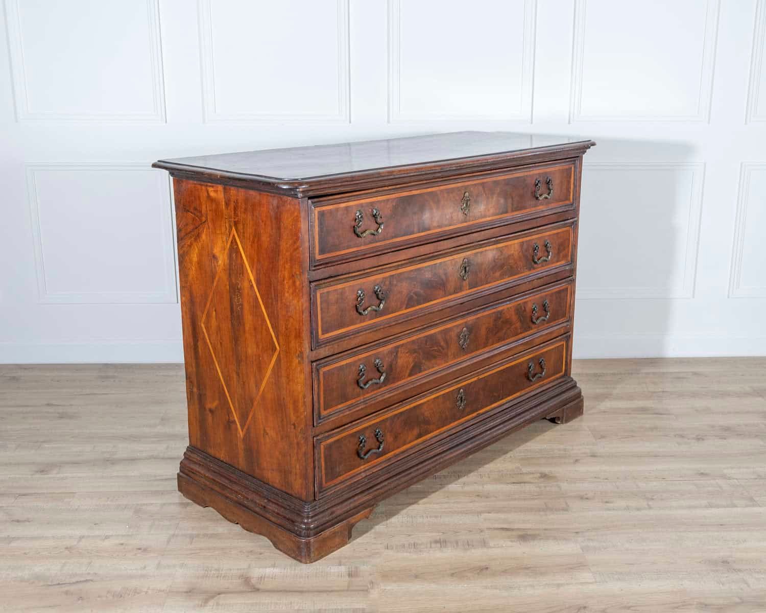 Early 18th-Century Emilian Walnut Chest of Drawers with Fruitwood Inlay - JAA
