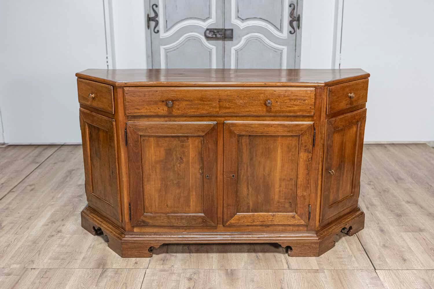 Italian 19th Century Walnut Credenza with Drawers over Doors and Canted Sides - JAA