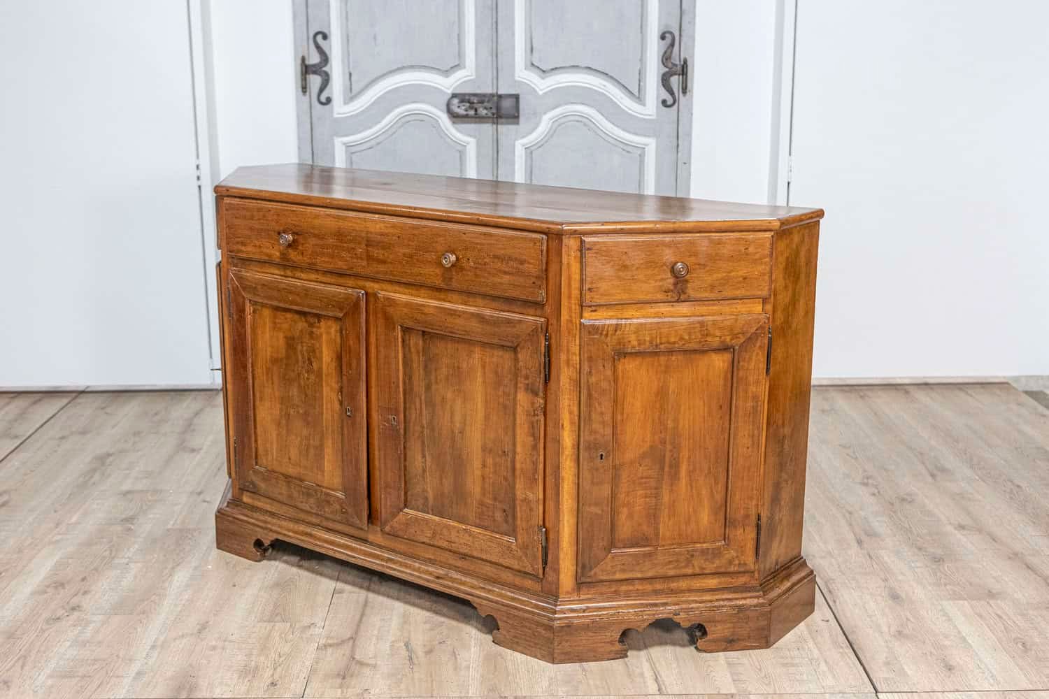 Italian 19th Century Walnut Credenza with Drawers over Doors and Canted Sides - JAA