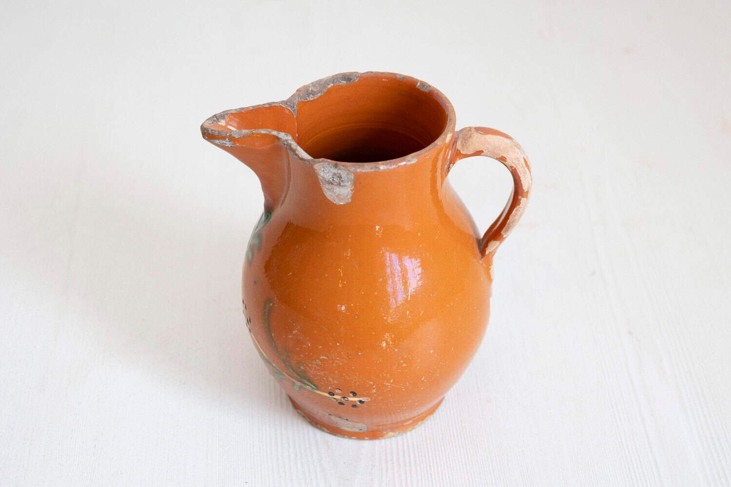 French 19th Century Redware Floral Pitcher with Orange, Cream and Green Glaze - JAA