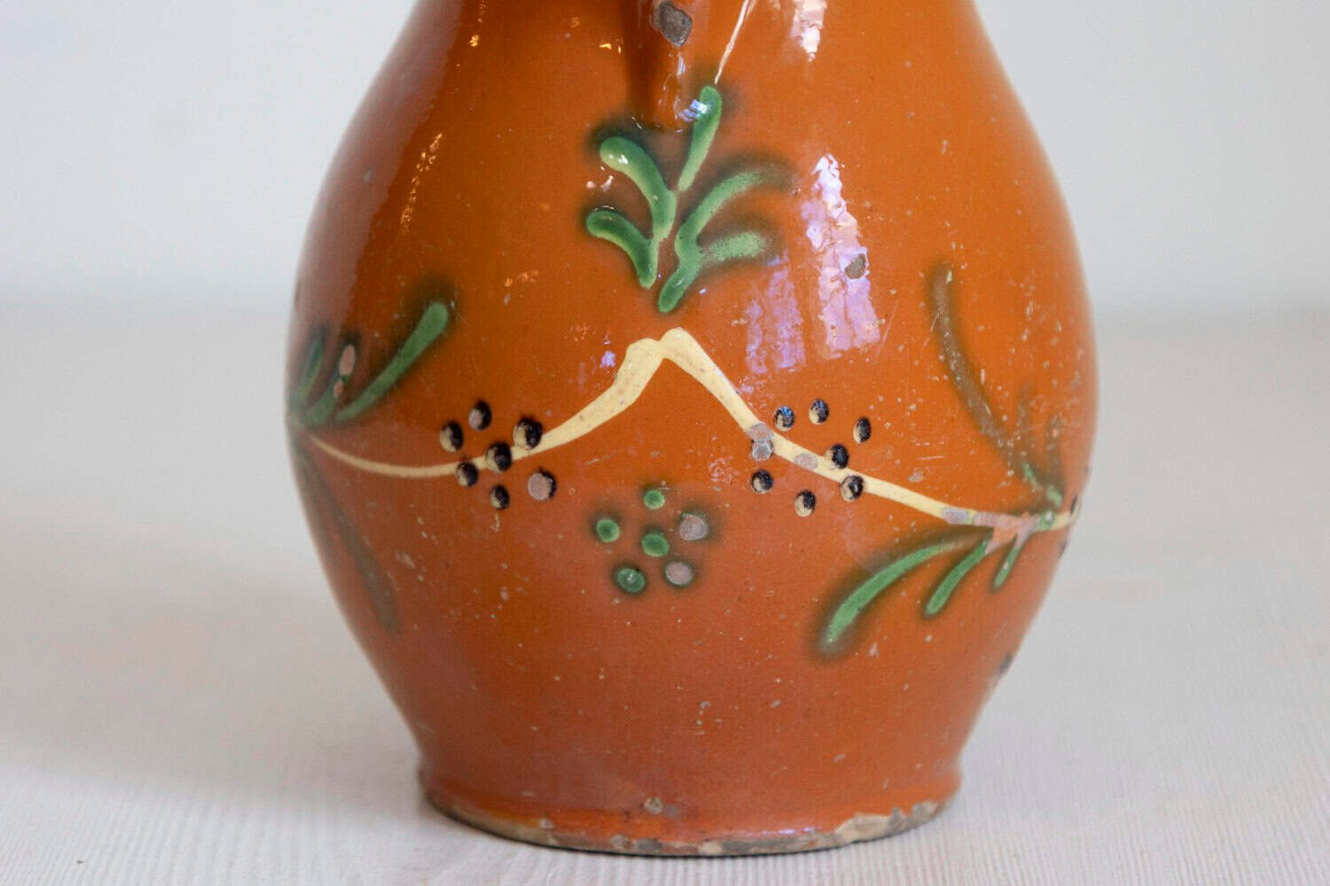 French 19th Century Redware Floral Pitcher with Orange, Cream and Green Glaze - JAA