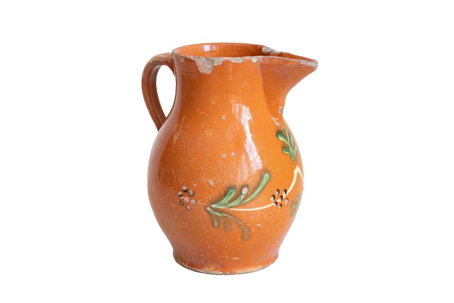 French 19th Century Redware Floral Pitcher with Orange, Cream and Green Glaze