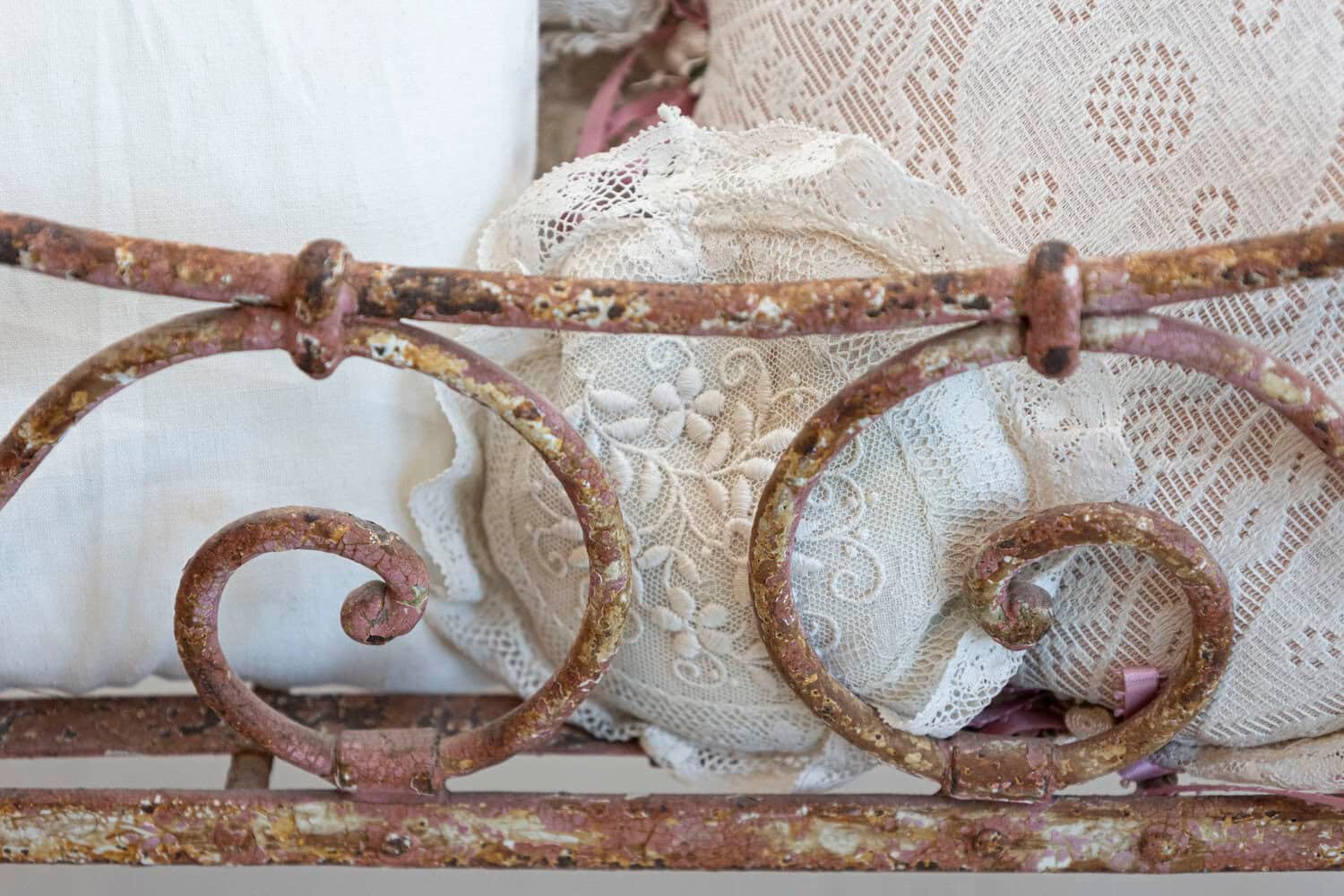 Assortment of Vintage Lace Pillows in 19th Century Metal Crib with Great Patina - JAA