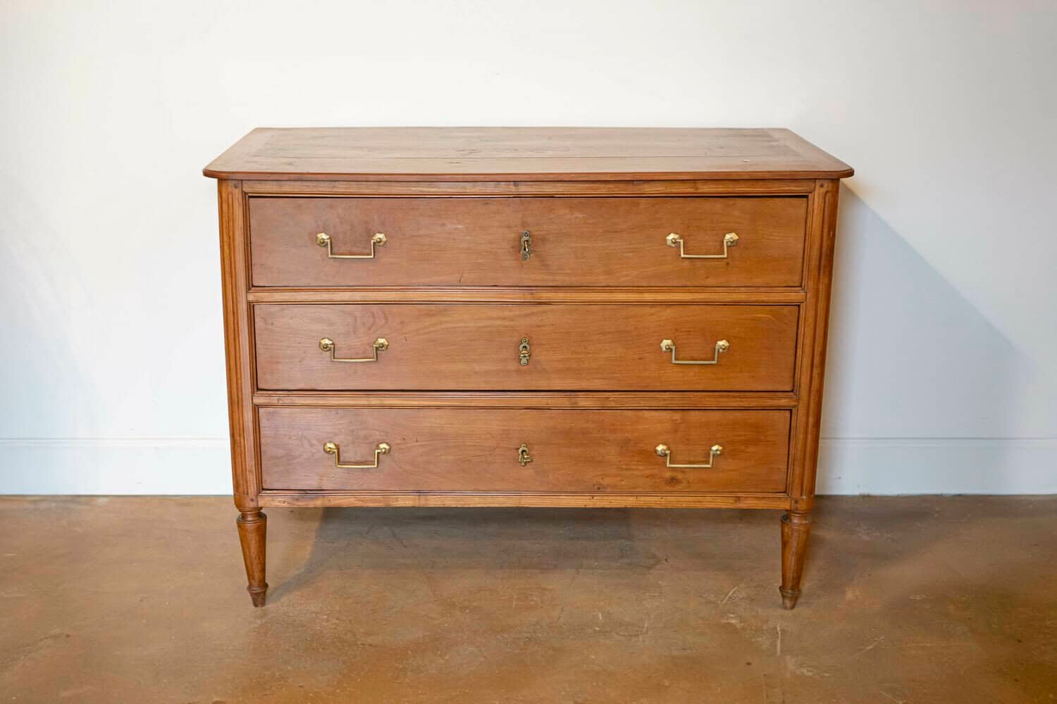 French 1790s Louis XVI Period Cherry Three-Drawer Commode with Fluted Side Posts - JAA