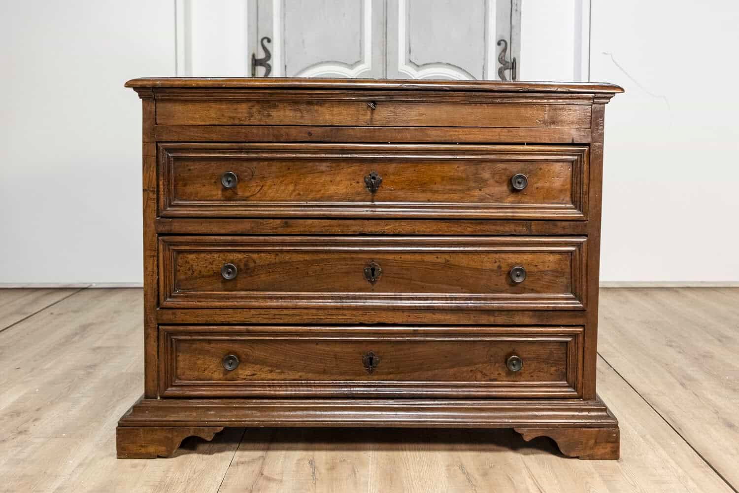 Italian 17th Century Walnut Four-Drawer Commode with Carved Bracket Feet - JAA