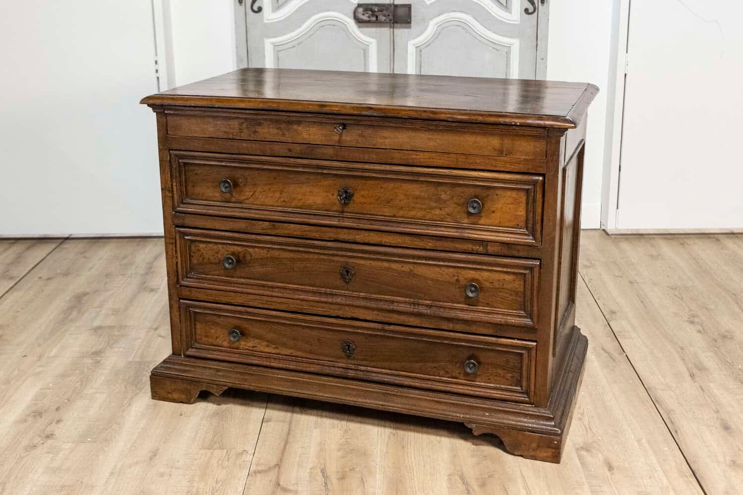 Italian 17th Century Walnut Four-Drawer Commode with Carved Bracket Feet - JAA