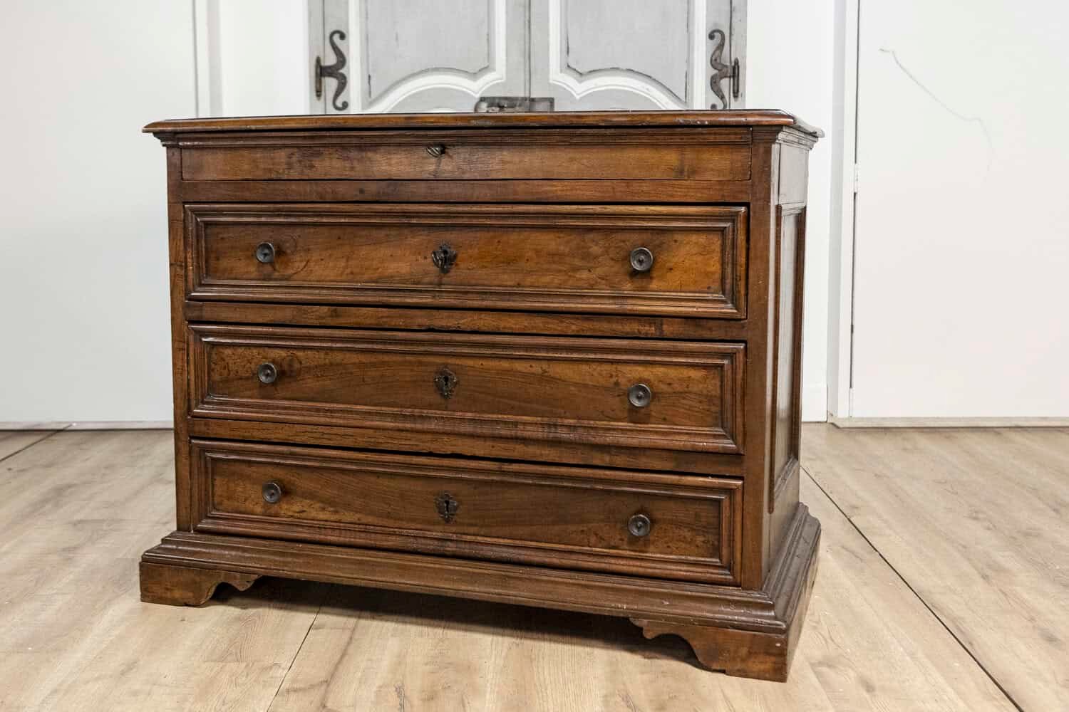 Italian 17th Century Walnut Four-Drawer Commode with Carved Bracket Feet - JAA
