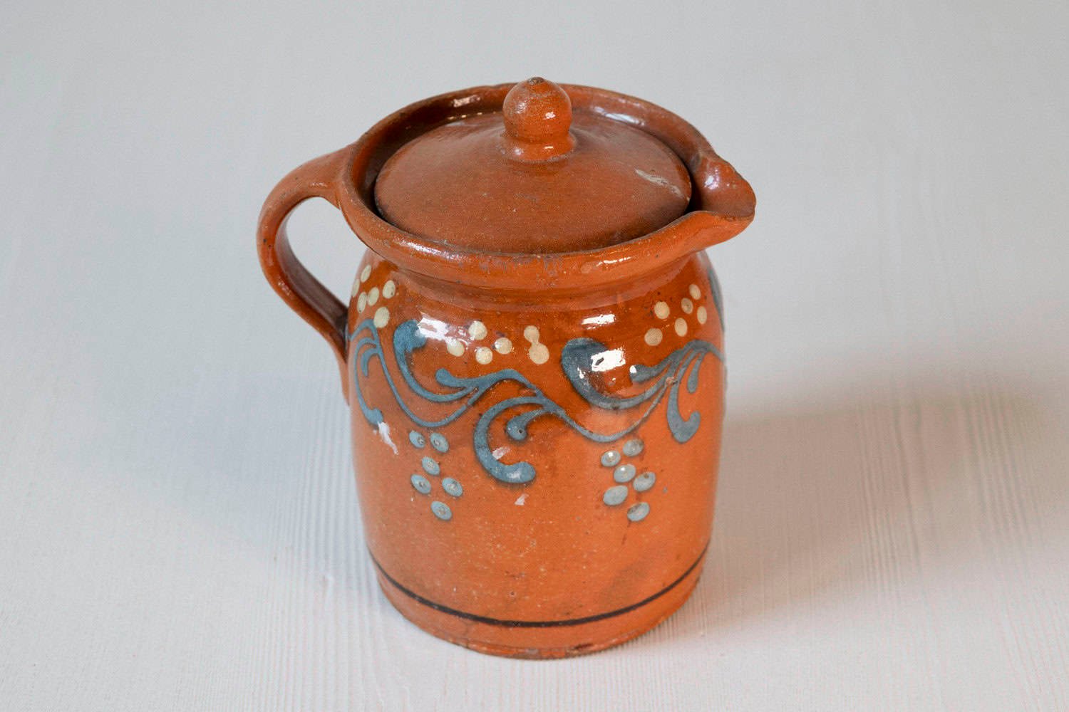 French 19th Century Pottery Pitcher with Orange and Blue Glaze and Foliage Motif - JAA