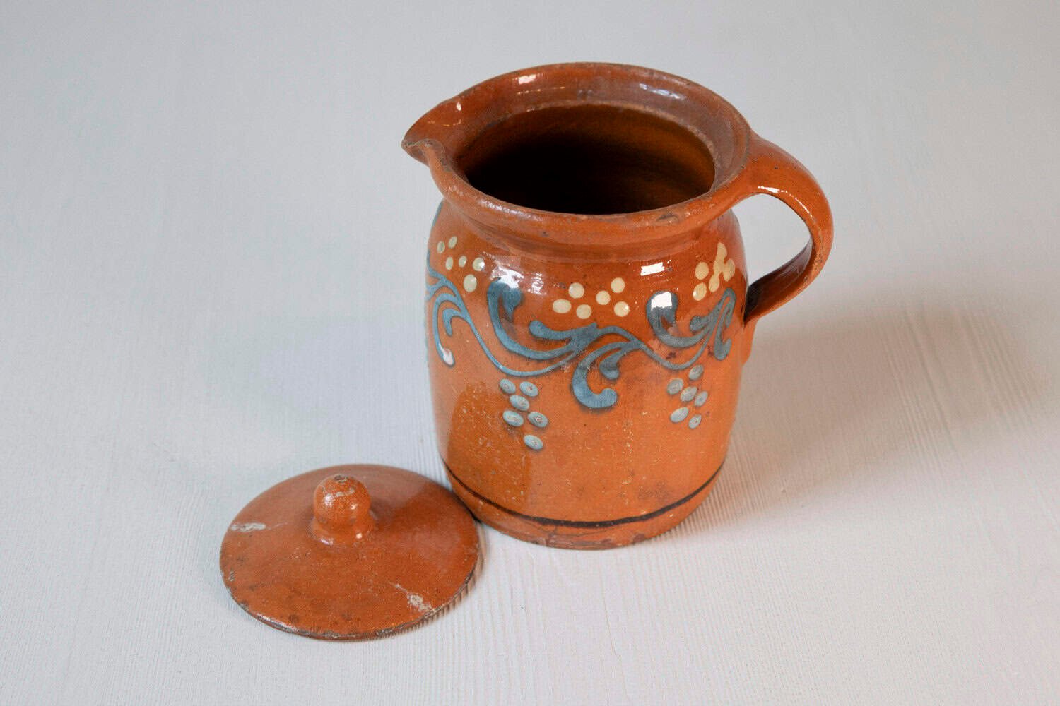 French 19th Century Pottery Pitcher with Orange and Blue Glaze and Foliage Motif - JAA