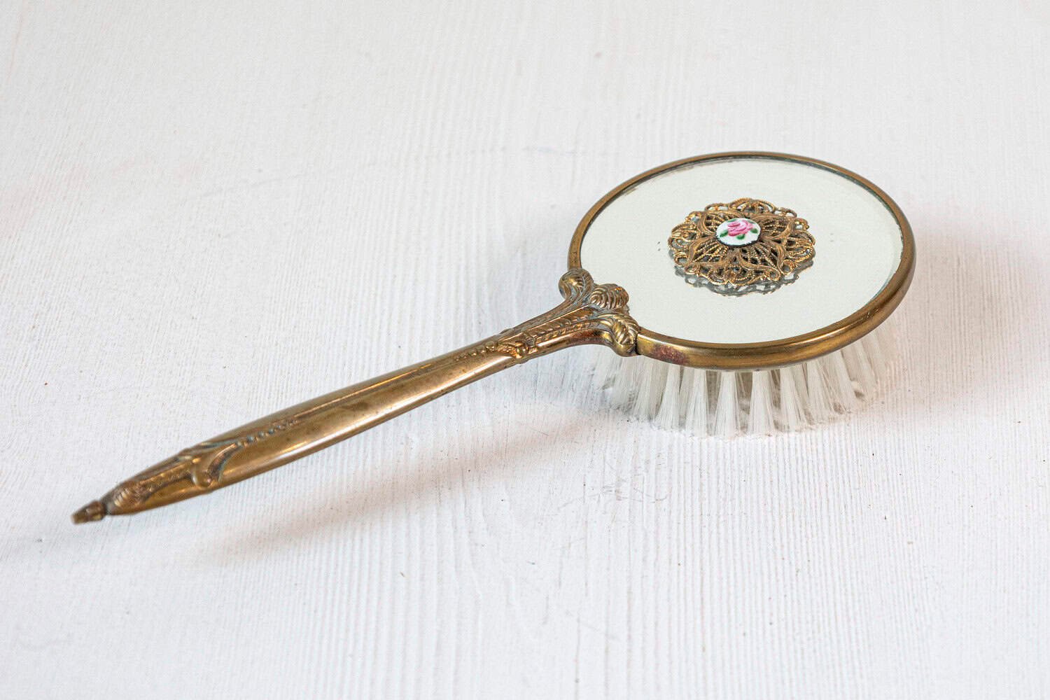 English 20th Century Mirrored Hair Brush with Brass Handle, Filigree Volute Décor and Painted Floral Medallion - JAA
