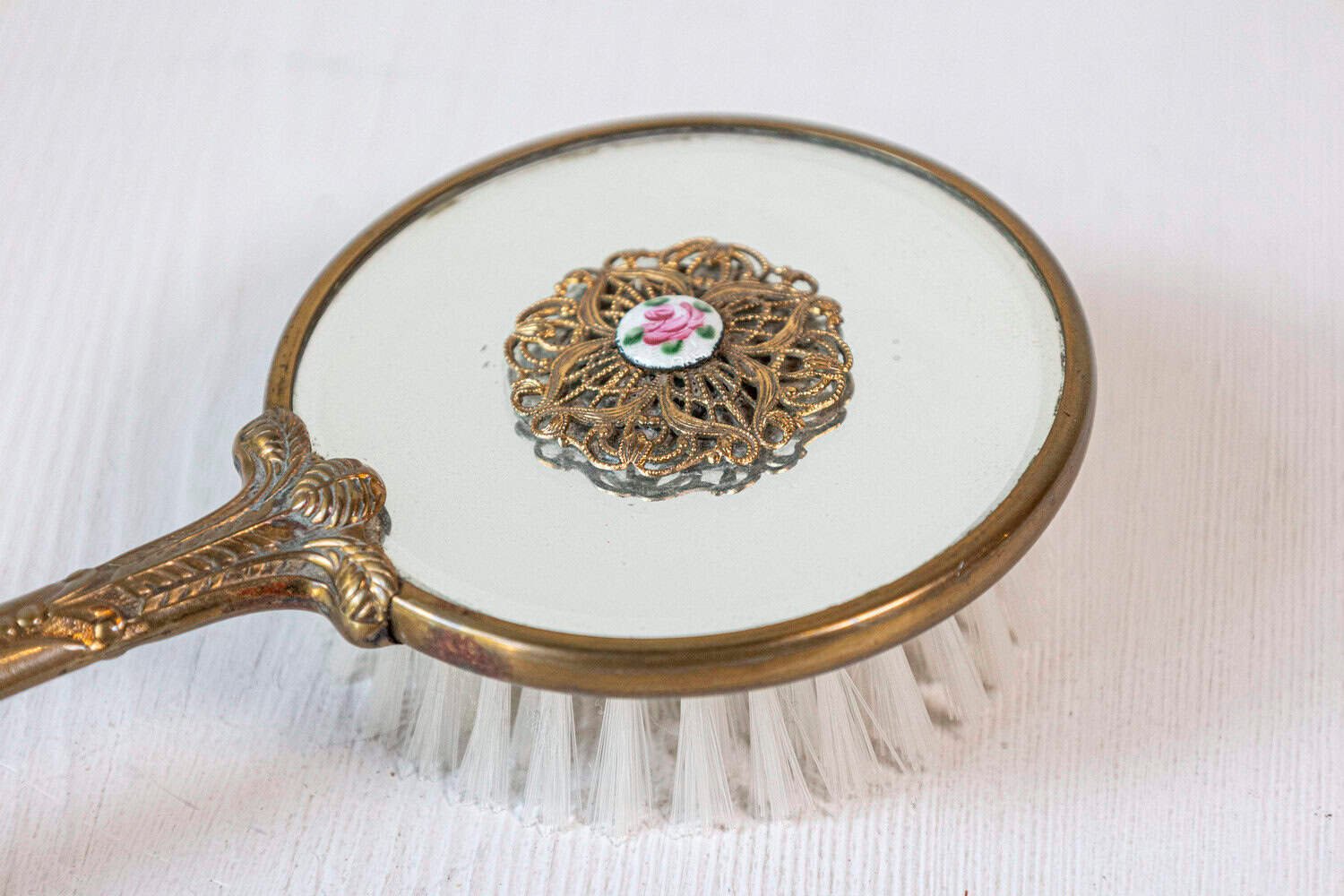 English 20th Century Mirrored Hair Brush with Brass Handle, Filigree Volute Décor and Painted Floral Medallion - JAA